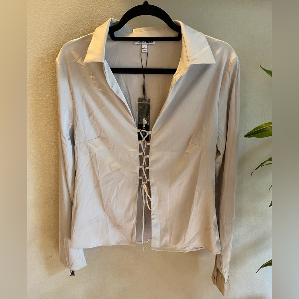 Never been worn- lace up silver long sleeve top